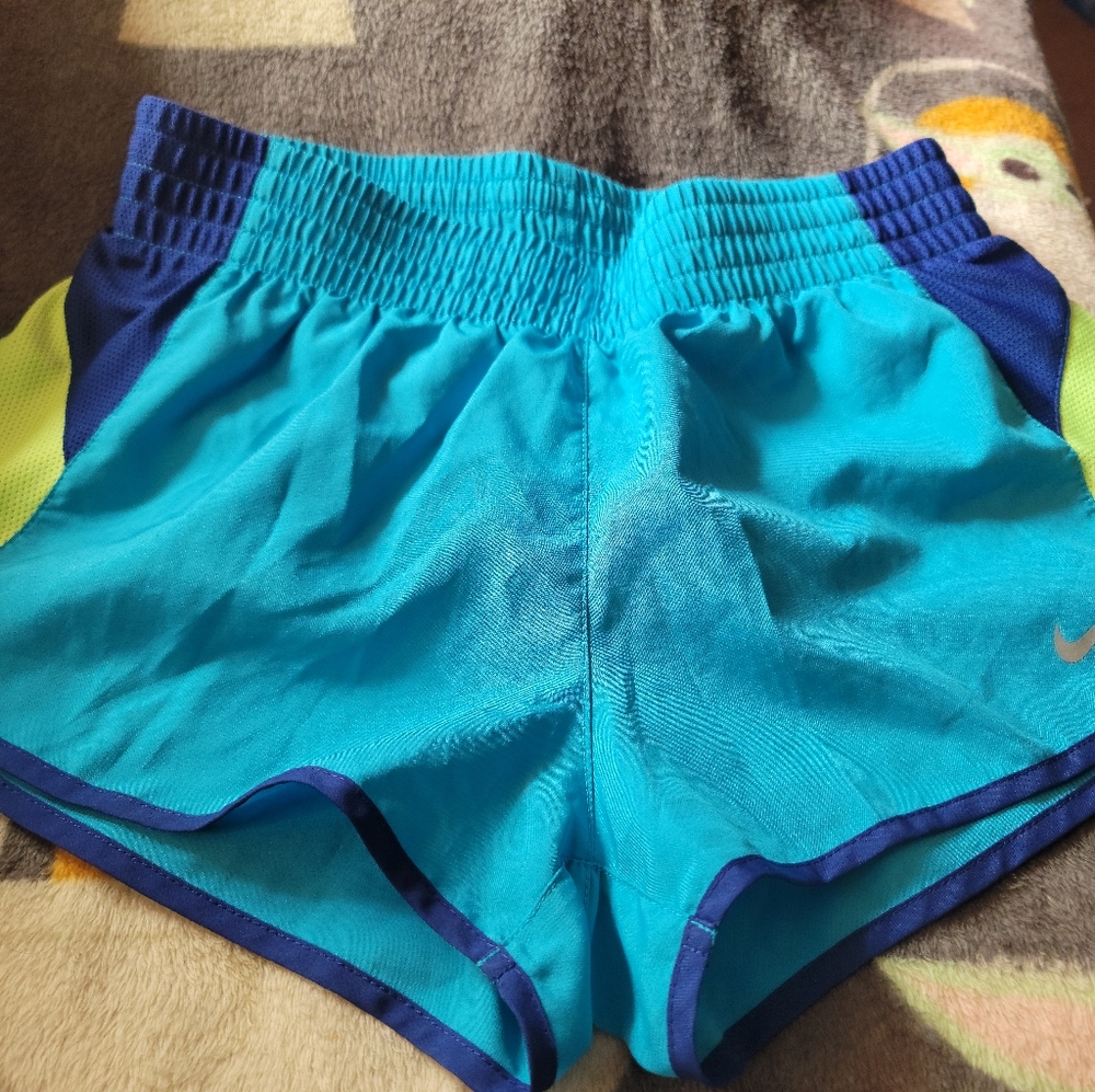 Nike Dri fit shorts. Size S light blue, navy blue,and lime green in color.